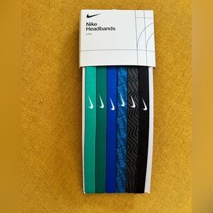 Nike headbands, six pack NWT. 1/2 inch wide. Greens, blues, and browns.